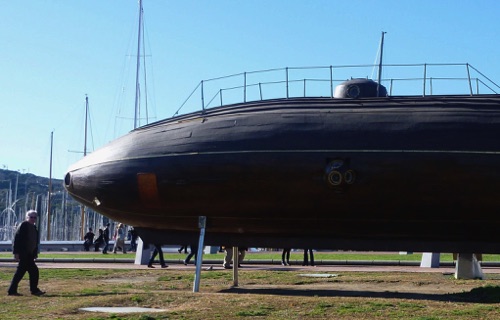 Replica of a wooden submarine built in 1864.  It  spent  days with a crew, 30 metres down in Barcelona harbour.